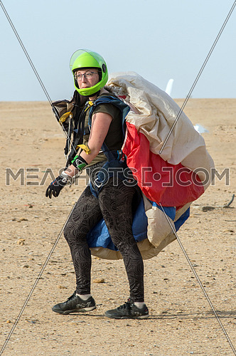Some people practice skydiving and air sport in the desert