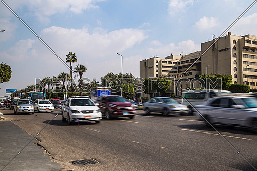 Long Shot for traffic at Salah Salim Street showing Le Meridien Hotel in background at Daytime