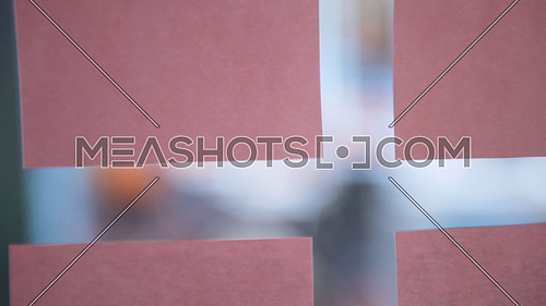 colorful memo stickers on  glass wall window,  modern office meeting room blurred in background