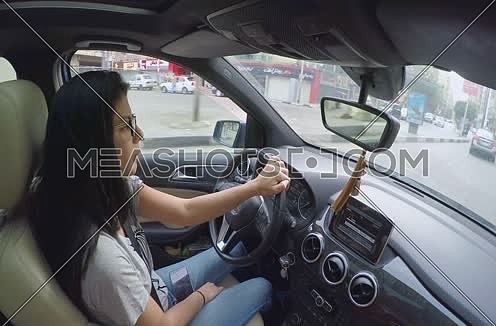 Inside car shot for female driving 