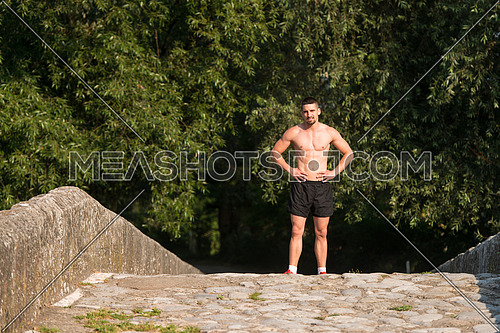 Portrait Of Young Man Doing Outdoor Activity Running
