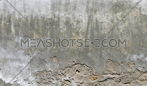 Old white and grey painted lime plaster concrete wall with weatherstains, runs and defects