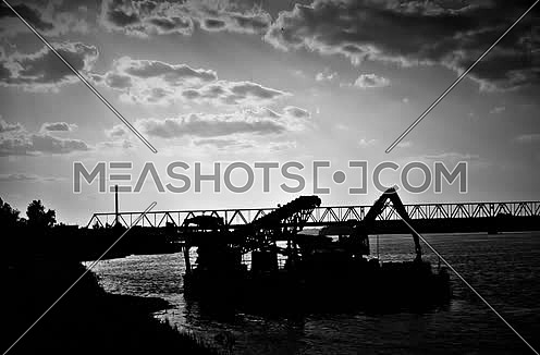 Bridge and barge in the dark