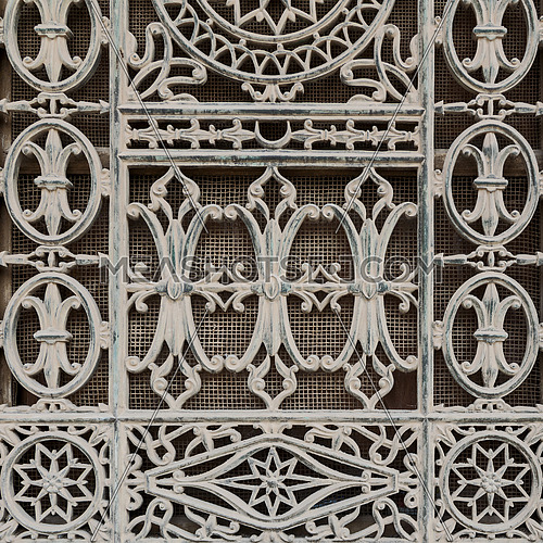 Grunge old window decorated with iron floral patterns, Mosque of Muhammad Ali, Cairo Citadel, Egypt