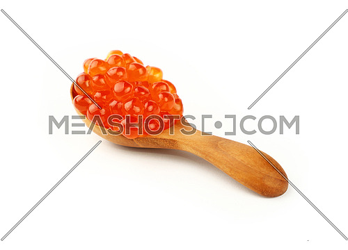 Close up wooden scoop spoon of salmon fish red caviar isolated on white background, elevated high angle view