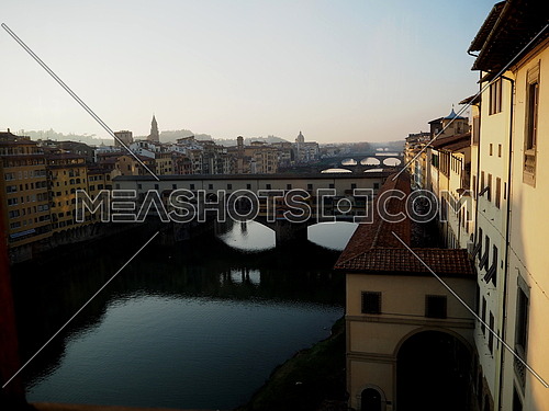 Florentine sunset over the Arno River, ponte vecchio,
