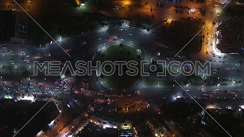 Fly Over top shot for Al Mohandseen area revealing Moustafa Mahmoud Square 22th of March 2018 in Giza  at Night