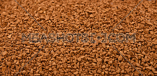 Close up background texture of freeze dried instant coffee granules