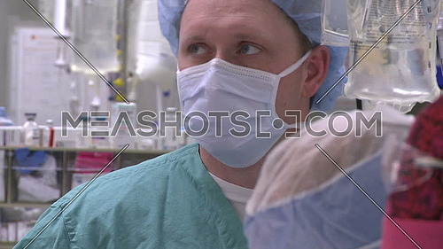 Close up for surgical technician face during surgery