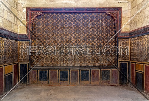 Background of old grunge wooden wall decorated with colorful painted floral patterns, Cairo, Egypt