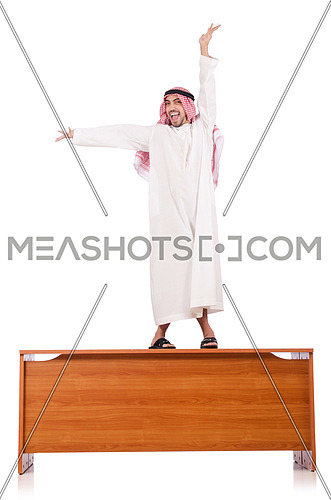 Arab man sitting at his desk
