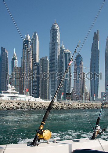 fishing rods or a boat in dubai UAE