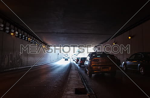 Track Left Shot for traffic from inside  Al Thawra Tunnel at Daytime