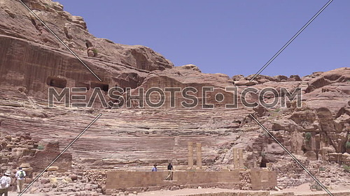 Left pan of theater carved into rock of Petra