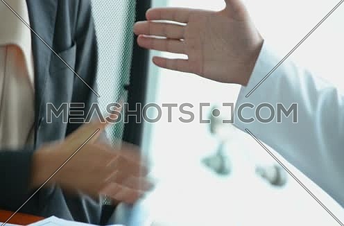 business people handshaking in conference room