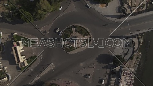 Aerial Bird-eye shot flying over Cairo Downtown empty streets showing Cairo Opera House and Saad Zaghloul Statue during the corona pandemic lockdown by day 10 April 2020
