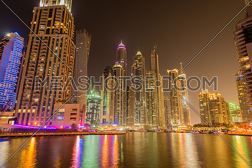 Dubai marina skyscrapers during night hours