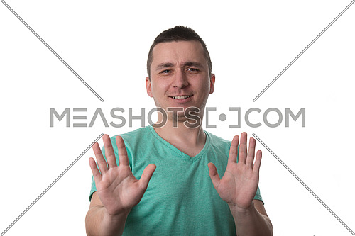 Afraid Man In Defense Attitude Gesturing Stop With Hands - Isolated On White Background