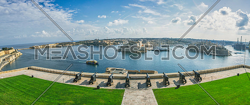 Valletta, Malta panorama - The traditional houses and walls of Valletta, the capital city of Malta on an early summer morning before sunrise with clea