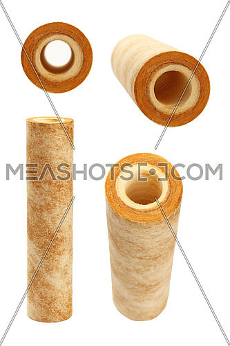 Used dirty rusty brown home sediment drinking water filter cartridge replacement for filtration and purification at pre-filter system, isolated on white background, close up