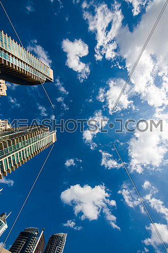 Dubai skyscrapers - blue sky and clouds