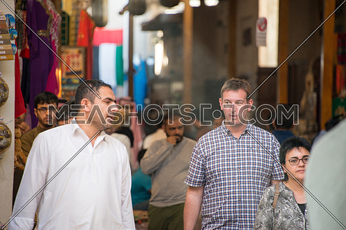tourists and sellers at the grand bazzar in Dubai, UAE