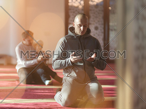 group of muslim people praying namaz  in mosque