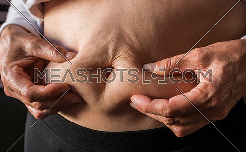 Woman holds blister pack of pills empty in their hands, conceptual image