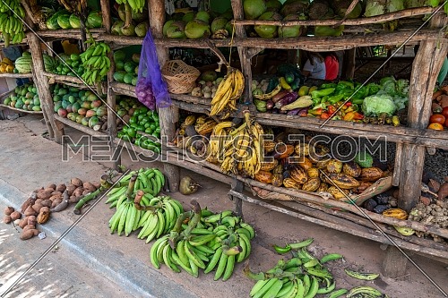 Fruits and vegetables shop on tropical marketplace on the street,Samana peninsula,Dominican republic.