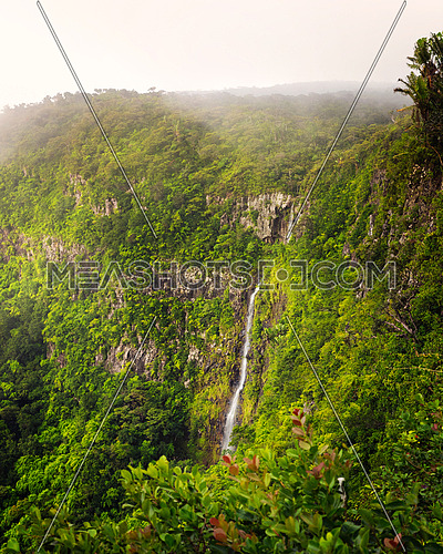 Amazing panorama of waterfall Black River Gorges and jungle around it, Mauritius.Vertical photo.