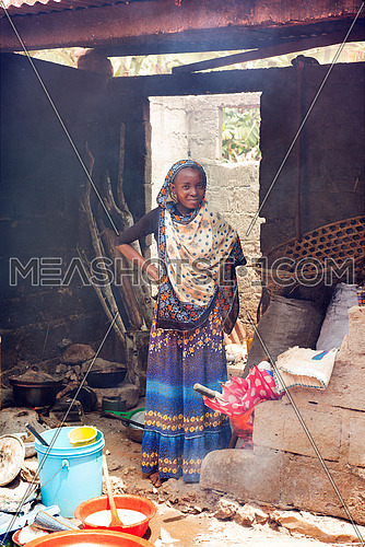 An african Girl In Kitchen