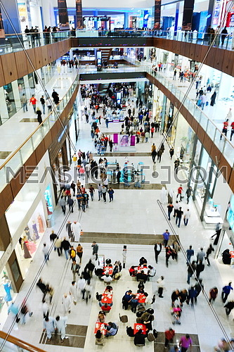 crowd shopper people in Interior of a modern shopping mall center