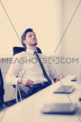 Portrait of a young business man looking depressed and worried from work at meeting office indors