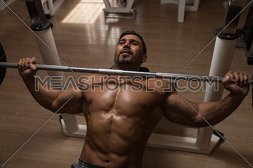 Mexican Bodybuilder Working Out Chest With Barbell