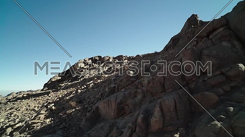 Follow shot for Sinai Mountain at day.