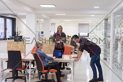 portrait of creative business people group in modern startup office interior