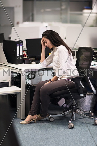 stressed busienss woman at workplace