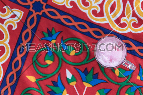 empty glass of hibiscus on table