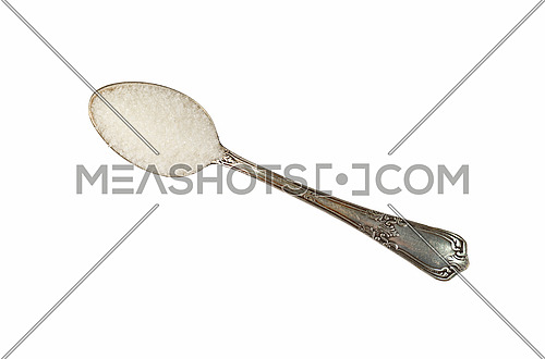 Close up one vintage metal spoon full of white sugar isolated on white background, elevated top view, directly above