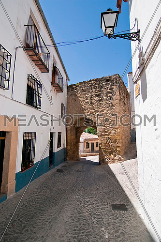 Mudejar door to the village at the end of the street, Sabiote
