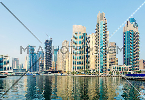 Dubai - AUGUST 9, 2014: Dubai Marina district on August 9 in UAE, Dubai. Dubai Marina district is a popular residential and business area.