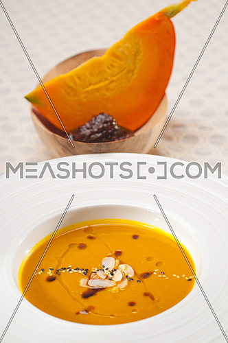 fresh classic traditional natural  pumpkin soup closeup macro