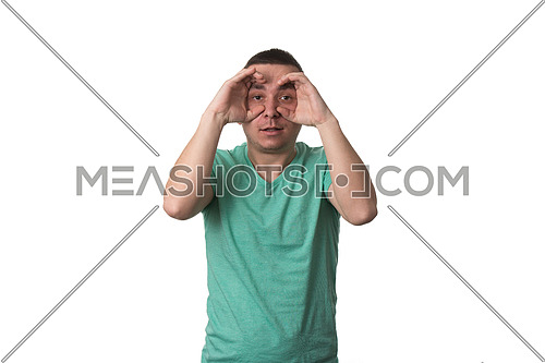Man Using Hands Like Glasses - Isolated On White Background