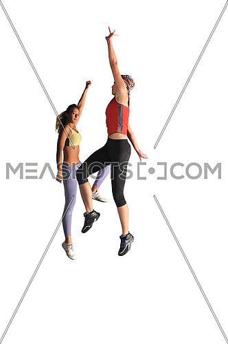 two womans work out and jumping in fitness club
