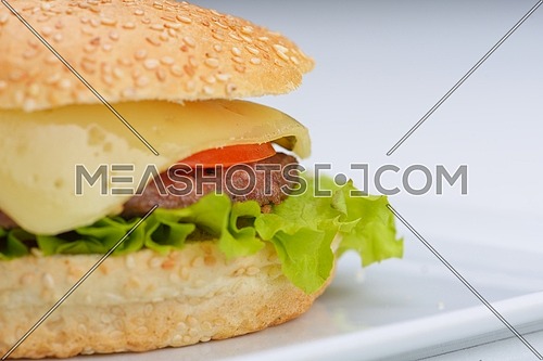 still life with fast food hamburger menu, french fries, soft drink and ketchup