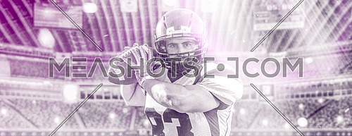 one quarterback american football player throwing ball isolated on big modern stadium field with lights and flares