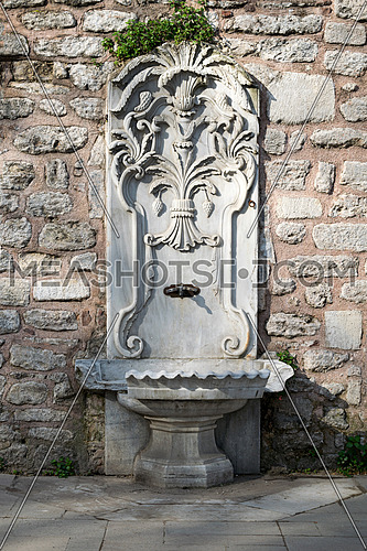 Marble sculpted drinking fountain at Gulhane Park, Sultan Ahmet district, Istanbul, Turkey