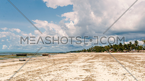 Low tide in zanzibar beach during the day.