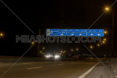 Long shot for Cars moving at Cairo-Alexandria Desert Road at Night