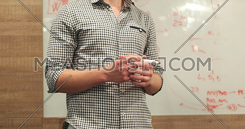 portrait of young businessman at startup office